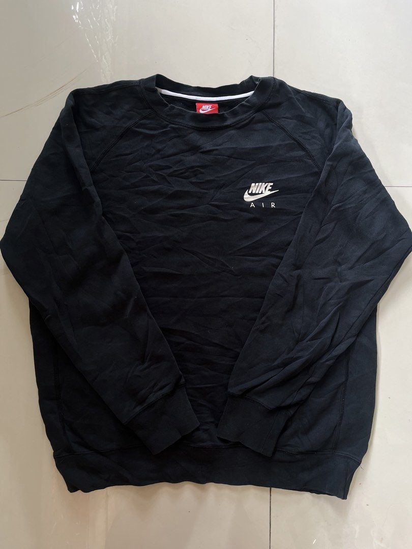 Nike Air Black Sweatshirt Pullover Size L (Category: Coats, Jackets and Outerwear) located in Manila. Submitted by silentforest_c1f6e4 (Listing ID 1467727241, Image 1). Description: - Brand: Nike - Style: Nike Air Crewneck Sweatshirt / Pullover - Color: Black with white inner collar stripe - Size: Men's Large - Details: Small Nike Air chest logo, giant Nike Air graphic on the back shoulders - Material: Super comfy fleece interior, ribbed cuffs an