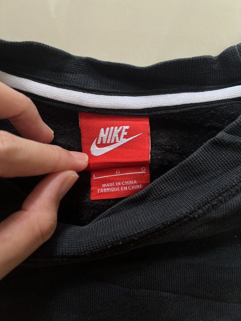 Nike Air Black Sweatshirt Pullover Size L (Category: Coats, Jackets and Outerwear) located in Manila. Submitted by silentforest_c1f6e4 (Listing ID 1467727241, Image 3). Description: - Brand: Nike - Style: Nike Air Crewneck Sweatshirt / Pullover - Color: Black with white inner collar stripe - Size: Men's Large - Details: Small Nike Air chest logo, giant Nike Air graphic on the back shoulders - Material: Super comfy fleece interior, ribbed cuffs an