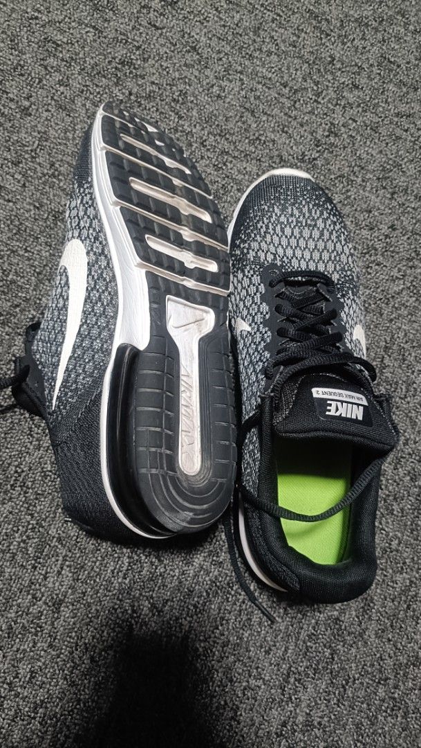 Nike Air Max Sequent 2 Black Grey US 10.5 (Category: Shoe inserts & accessories) located in Quezon City. Submitted by vbhacemnz (Listing ID 1467733516, Image 2). Description: - Brand/Model: Nike Air Max Sequent 2 - Colorway: Black and cool grey mesh upper with white swoosh and neon green insoles - Size: US 10.5 | UK 9.5 | EUR 44.5 | 28.5 cm - Condition: Outsoles show minimal dirt, tread is mostly intact - Features: Visible air cushioning in the h