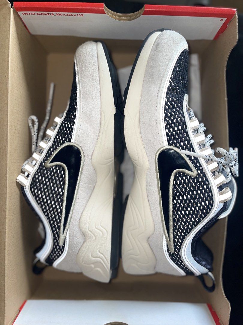 Nike Air Zoom Spiridon x UNDEFEATED Phantom (Category: Sneakers) located in Pasig City. Submitted by blu_papellero (Listing ID 1467690217, Image 3). Description: - Brand: Nike x UNDEFEATED - Model: Air Zoom Spiridon 'Phantom' - Colorway: Black mesh upper with beige suede overlays - Features: Reflective laces, UNDEFEATED tongue branding, and blue heel pull tab - Packaging: Comes with original Nike shoebox.