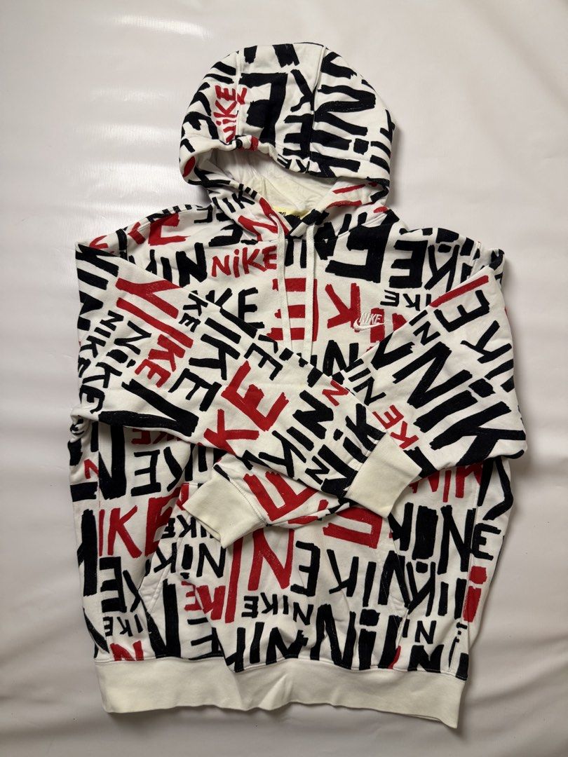 Nike All-Over Print Logo Hoodie (Category: Hoodies) located in Gapan. Submitted by rasthriftshop (Listing ID 1467804564, Image 2). Description: NIKE Aop Size on tag: XL Dimes: 24 x 28 ₱800 + sf Condition: Excellent Color rate: 9/10 Issue: None.