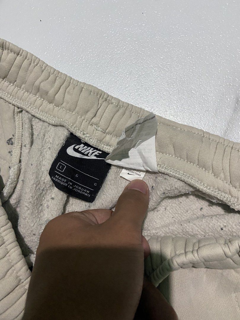 Nike Beige Fleece Shorts Size Large (Category: Shorts) located in Quezon City. Submitted by johncen (Listing ID 1467839140, Image 3). Description: - Brand: Nike - Style: Fleece shorts with large white Swoosh print - Color: Beige - Size: Large (Made in Jordan) - Features: Elastic waistband, side pockets.