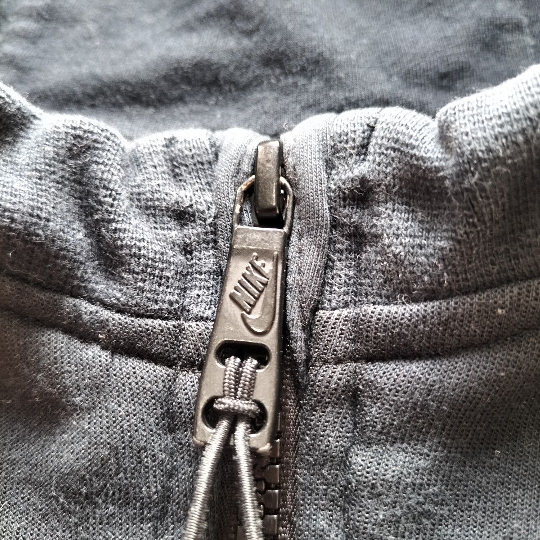 Nike Black Zip-Up Hoodie (Category: Hoodies) located in Taytay. Submitted by calmtree-6248 (Listing ID 1467637812, Image 3). Description: - Brand: Nike - Item: Zip-up hoodie - Color: Black - Size: L (Best for chest ~90cm, height 160-170cm) - Material: 69% cotton, 31% polyester blend - Features: Structured hood, toggle zipper pull, regular fit, standard long sleeves - Condition: Great everyday layering piece, easy to throw on.
