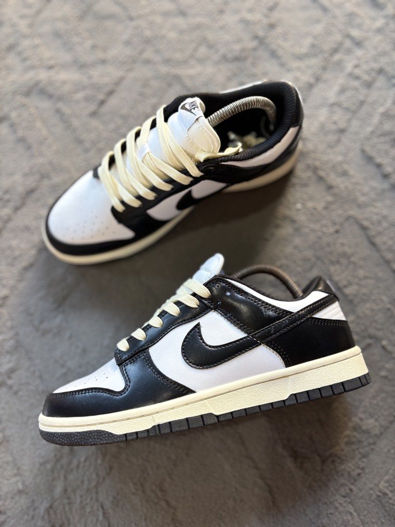 Nike Dunk Low Panda Black White Cream Laces (Category: Sneakers) located in Lapu Lapu. Submitted by jadegodine04736 (Listing ID 1467650023, Image 3). Description: - Model: Nike Dunk Low - Colorway: Classic Black and White with custom vintage cream laces - Size: US 7.5 / EUR 40.5 - Condition: Clean soles, sharp stitching, and solid overall shape - Features: Classic leather upper, perforated toe box, and padded collar - Style: Essential streetwear 