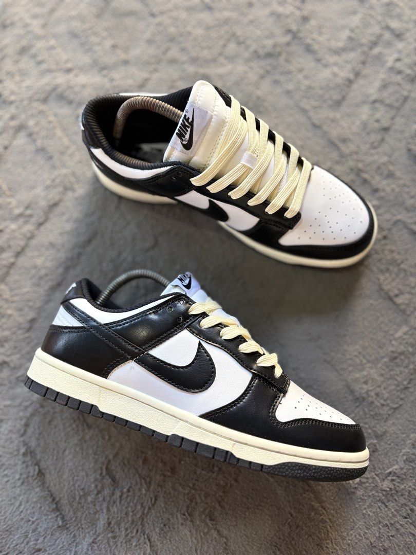 Nike Dunk Low Panda Black White Cream Laces (Category: Sneakers) located in Lapu Lapu. Submitted by jadegodine04736 (Listing ID 1467650023, Image 1). Description: - Model: Nike Dunk Low - Colorway: Classic Black and White with custom vintage cream laces - Size: US 7.5 / EUR 40.5 - Condition: Clean soles, sharp stitching, and solid overall shape - Features: Classic leather upper, perforated toe box, and padded collar - Style: Essential streetwear 