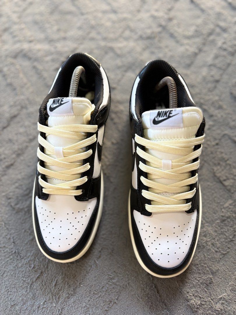 Nike Dunk Low Panda Black White Cream Laces (Category: Sneakers) located in Lapu Lapu. Submitted by jadegodine04736 (Listing ID 1467650023, Image 2). Description: - Model: Nike Dunk Low - Colorway: Classic Black and White with custom vintage cream laces - Size: US 7.5 / EUR 40.5 - Condition: Clean soles, sharp stitching, and solid overall shape - Features: Classic leather upper, perforated toe box, and padded collar - Style: Essential streetwear 