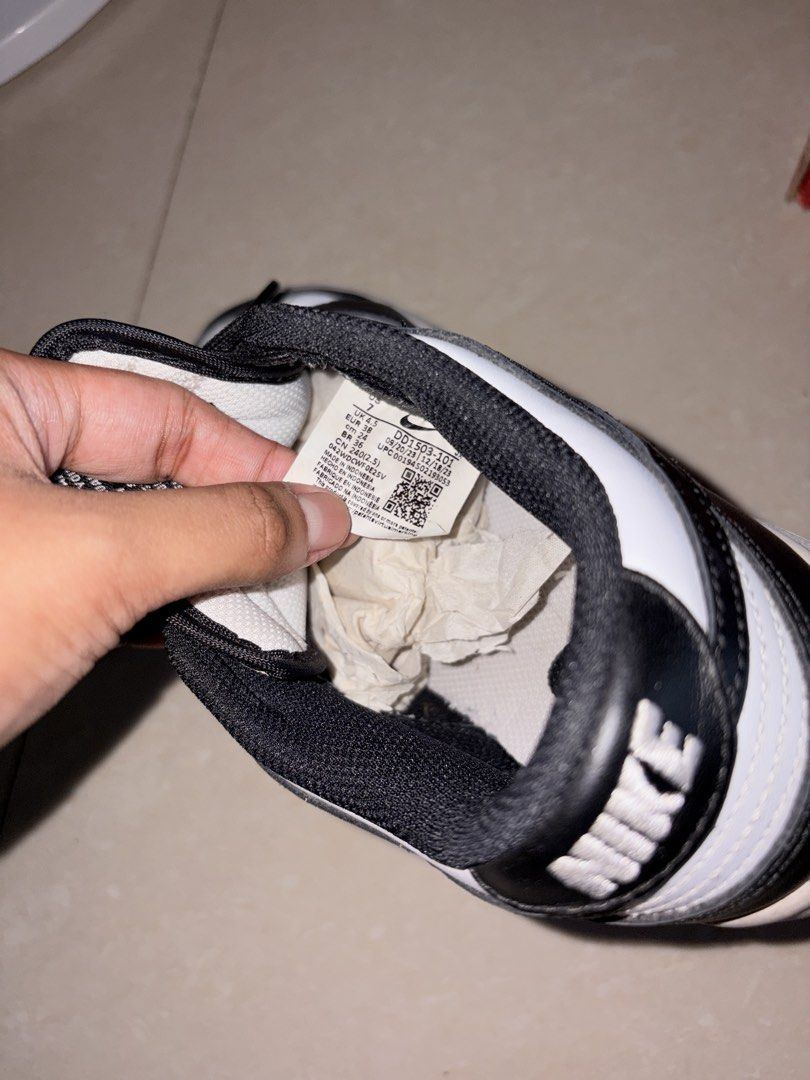Nike Dunk Low Panda DD1503-101 Size US 7 (Category: Sneakers) located in Manila. Submitted by so.soiaa (Listing ID 1467681849, Image 2). Description: - Model: Nike Dunk Low Retro (Panda / Black & White) - Size: US 7 / EUR 38 - Inclusions: Original red Nike box - Features: Iconic streetwear silhouette, contrast overlays, perforated toe box, and black laces - Condition: Great addition to any sneaker rotation.