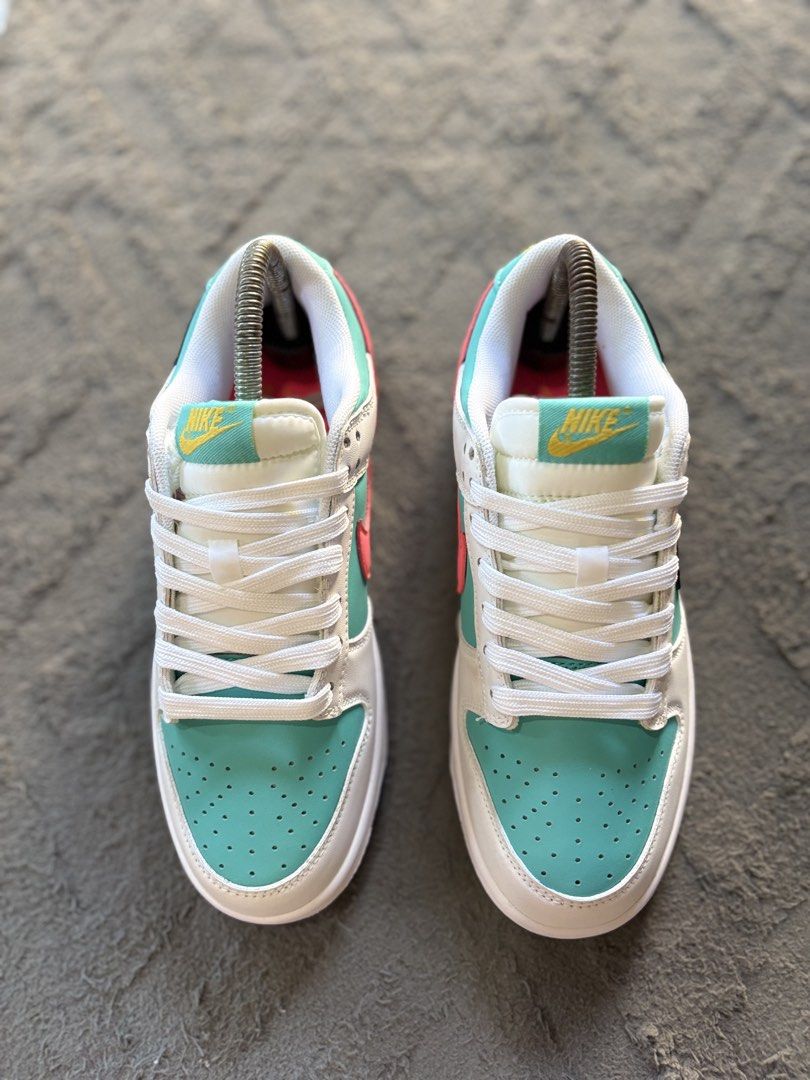 Nike Dunk Low Size 7 Womens 24cm (Category: Sneakers) located in Lapu Lapu. Submitted by jadegodine04736 (Listing ID 1467650060, Image 2). Description: - Model: Nike Dunk Low - Colorway: Teal/White/Pink/Navy with Gold Embroidery - Details: Crisp white laces, vibrant pink insoles, gold tongue and heel tab accents - Size: US 7 Women's / 24cm - Style Code: HF4850-345 - Condition: Brand New / Deadstock - Trusted seller, fast shipping across the Phili