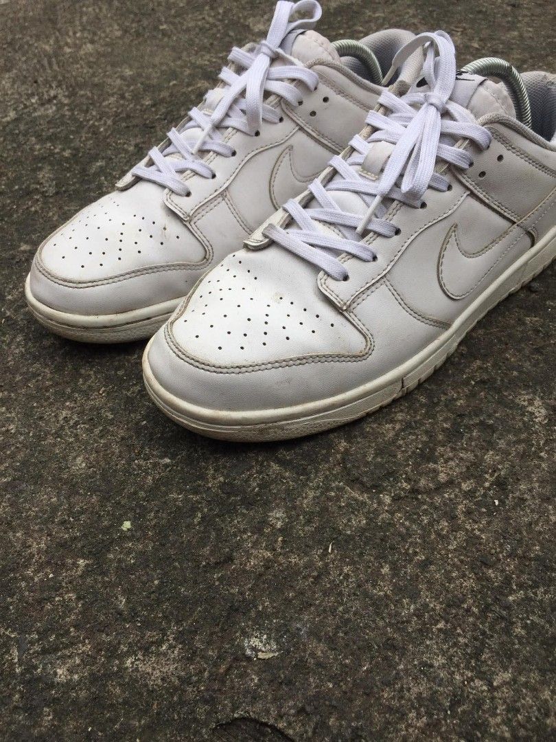 Nike Dunk Low size 9.5 Triplewhite Shoes (Category: Sneakers) located in Naga. Submitted by bonethugz1822 (Listing ID 1467736929, Image 2). Description: 1500 shipped na Verygood condition 9/10 No issues need wash lang As is.