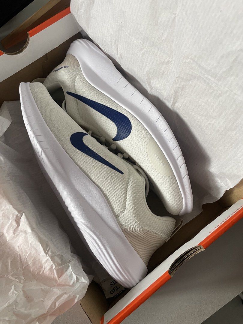 Nike Flex Experience 12 White Blue Sneakers (Category: Sneakers) located in Meycauayan. Submitted by mykajoysum57833 (Listing ID 1467674501, Image 2). Description: - Brand: Nike - Model: Flex Experience 12 - Colorway: White with Blue Swoosh details - Material: Breathable textured mesh upper with white chunky soles - Closure: Lace-up front - Condition: Brand new with original Nike shoebox, tissue paper, and silica gel packet - Style: Lightweight, 