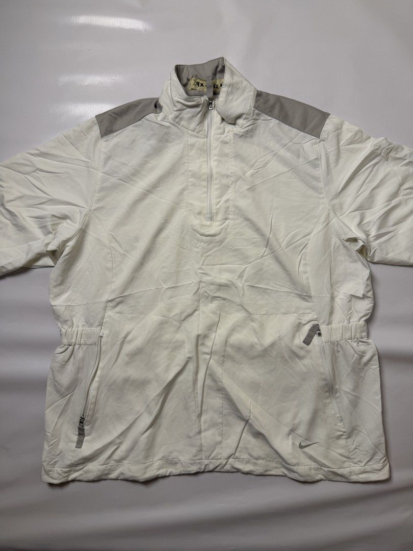Nike Golf White Grey Quarter Zip Jacket XL (Category: Coats, Jackets and Outerwear) located in Gapan. Submitted by rasthriftshop (Listing ID 1467805159, Image 1). Description: NIKE Windbreaker Size on tag: XL Dimes: 24 x 28 ₱600 + sf Condition: Excellent Color rate: 9/10 Issue: None.