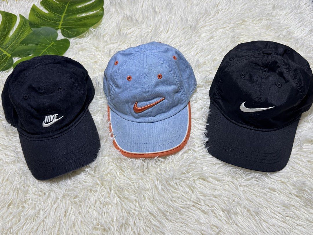 Nike Kids Caps Three take all (Category: Babies & Kids Fashion) located in Dagupan City. Submitted by iamrannflores (Listing ID 1467626175, Image 1). Description: - Bundle includes 3 Nike caps for kids (2 black, 1 light blue with orange trim) - Adjustable back straps for a customizable and secure fit - Ideal for everyday casual wear, outdoor play, and sun protection - Various sizes suitable for toddlers and children - Comfortable material mix inc