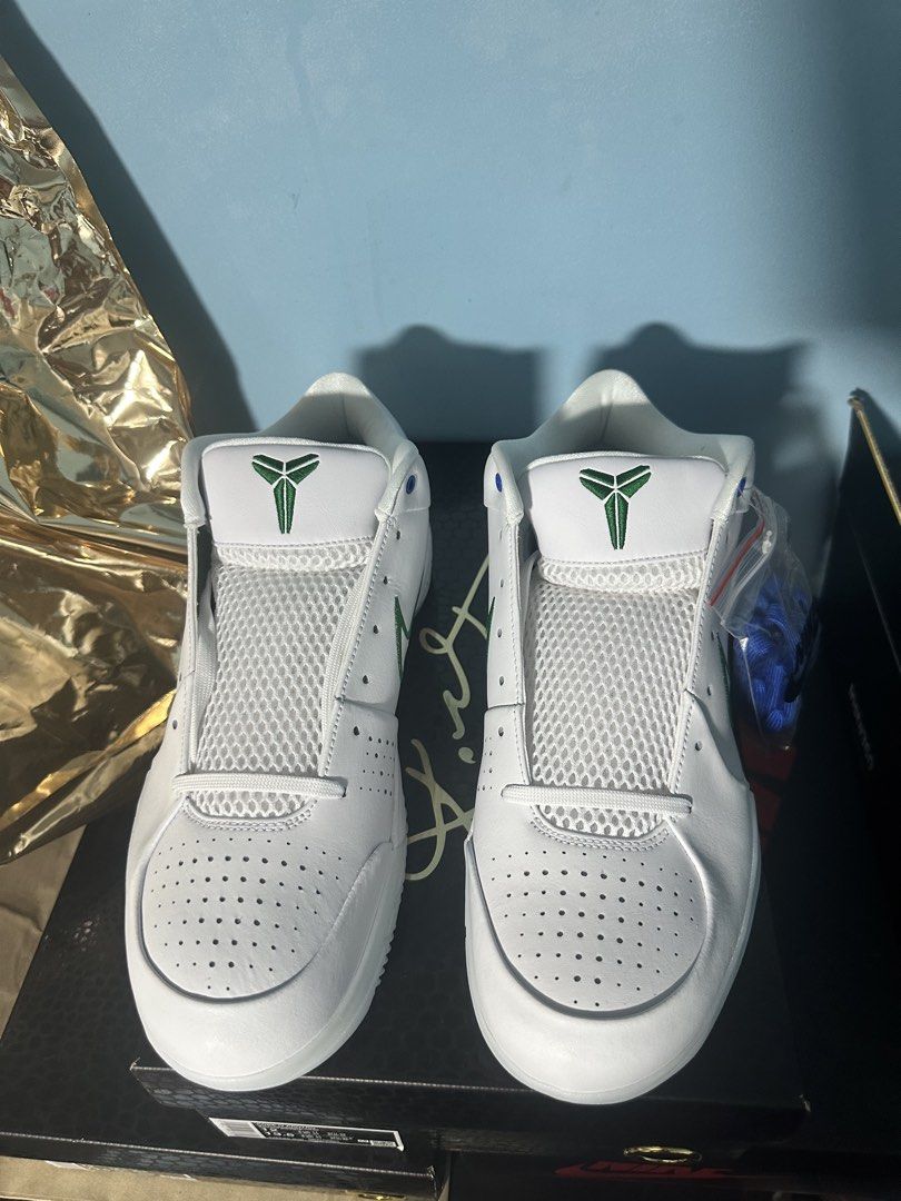 Nike Kobe 4 Protro White Green Blue (Category: Sneakers) located in Manila. Submitted by linomer (Listing ID 1467825409, Image 2). Description: - Model: Nike Kobe 4 Protro - Colorway: White with Green Swoosh - Size: US 12 - Condition: Brand new, clean uppers, fresh out of the packaging - Details: Numbers 8 and 24 embroidered on the heels - Includes: Original box and extra blue laces.