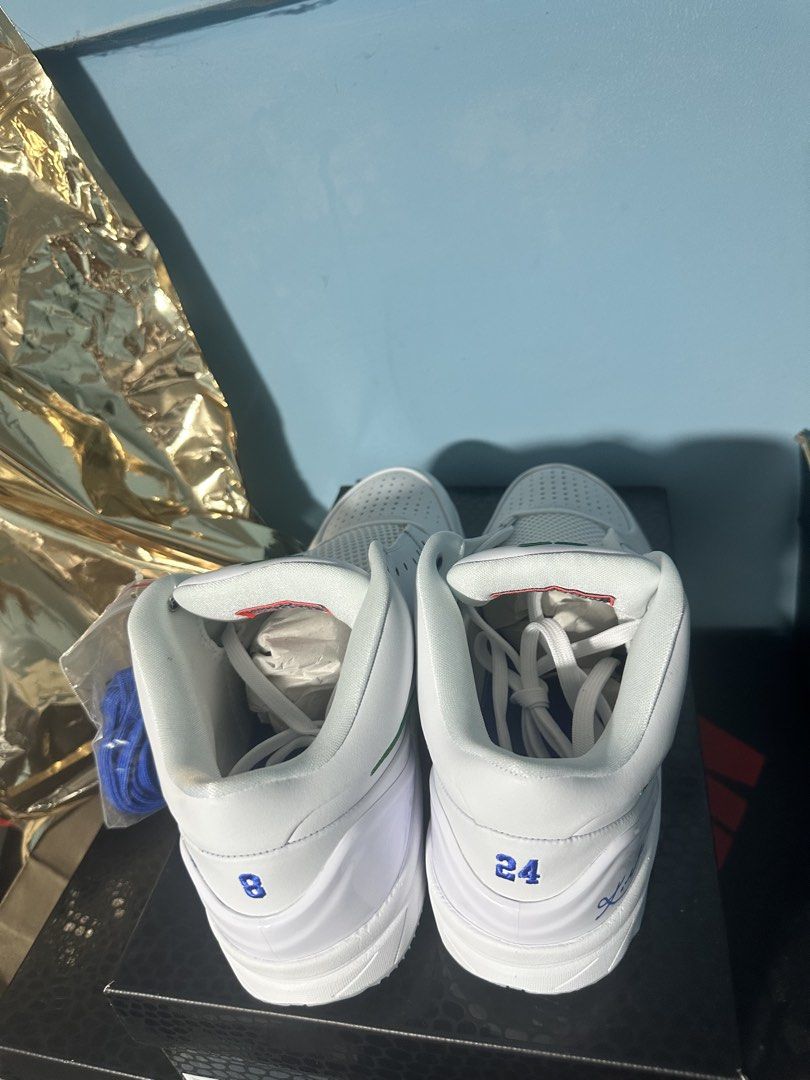 Nike Kobe 4 Protro White Green Blue (Category: Sneakers) located in Manila. Submitted by linomer (Listing ID 1467825409, Image 1). Description: - Model: Nike Kobe 4 Protro - Colorway: White with Green Swoosh - Size: US 12 - Condition: Brand new, clean uppers, fresh out of the packaging - Details: Numbers 8 and 24 embroidered on the heels - Includes: Original box and extra blue laces.