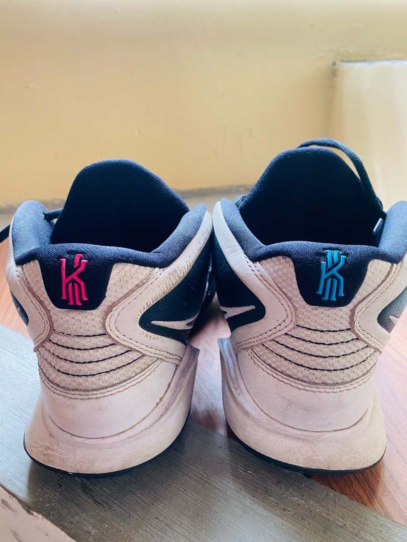 Nike Kyrie Infinity Basketball Shoes (Category: Racket and Ball Sports) located in Manila. Submitted by von_vito (Listing ID 1467676774, Image 1). Description: - Model: Nike Kyrie Infinity - Colorway: Black/White with mismatching pink and blue accents - Size: US 8 - Cushioning: Zoom Air setup - Condition: Normal wear on midsoles and outsoles from court use, lots of traction left - Perfect for ballers and Kyrie fans looking for performance and sty