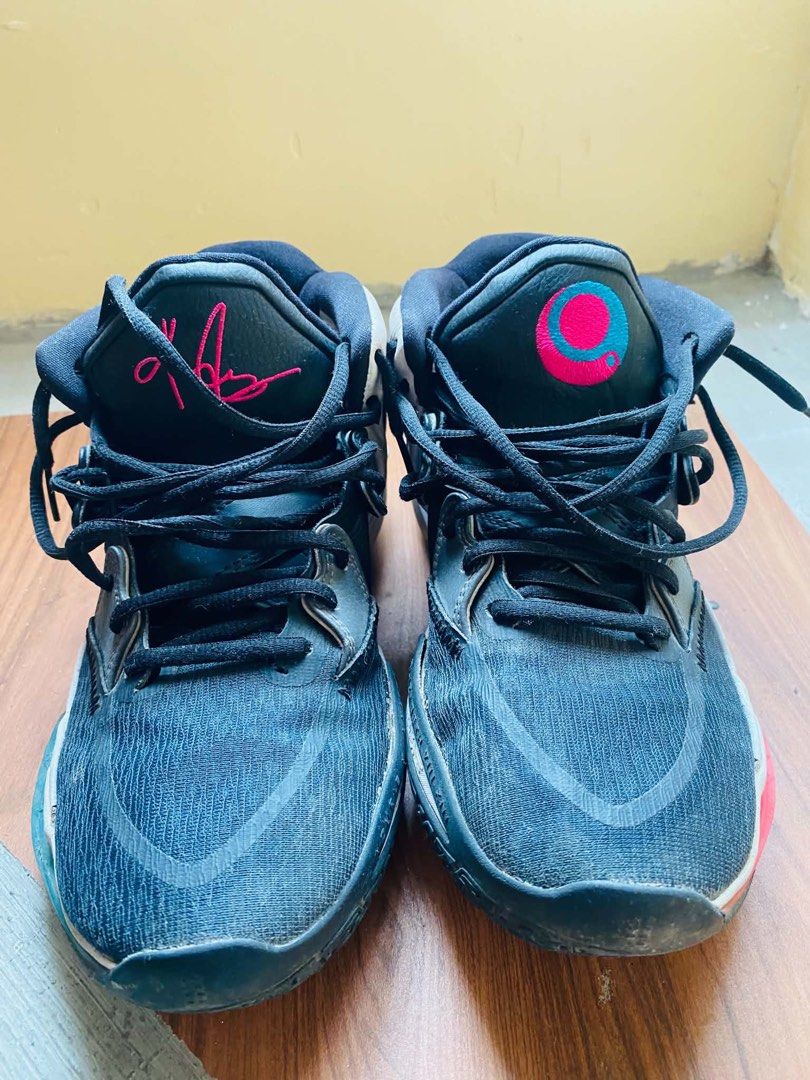 Nike Kyrie Infinity Basketball Shoes (Category: Racket and Ball Sports) located in Manila. Submitted by von_vito (Listing ID 1467676774, Image 2). Description: - Model: Nike Kyrie Infinity - Colorway: Black/White with mismatching pink and blue accents - Size: US 8 - Cushioning: Zoom Air setup - Condition: Normal wear on midsoles and outsoles from court use, lots of traction left - Perfect for ballers and Kyrie fans looking for performance and sty