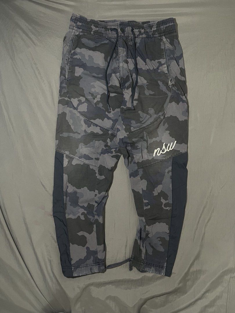 nike NSW camou pants (Category: Joggers) located in Manila. Submitted by lloydiemmfmannn (Listing ID 1467723011, Image 1). Description: nike NSW camou pants sz M on tag w32 l38.5 hem 6 flaws: minor scratches pasay location.