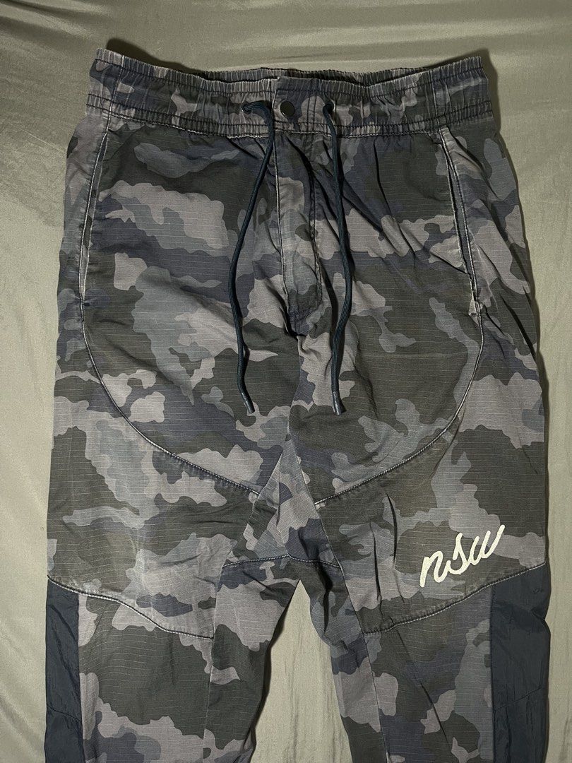 nike NSW camou pants (Category: Joggers) located in Manila. Submitted by lloydiemmfmannn (Listing ID 1467723011, Image 2). Description: nike NSW camou pants sz M on tag w32 l38.5 hem 6 flaws: minor scratches pasay location.