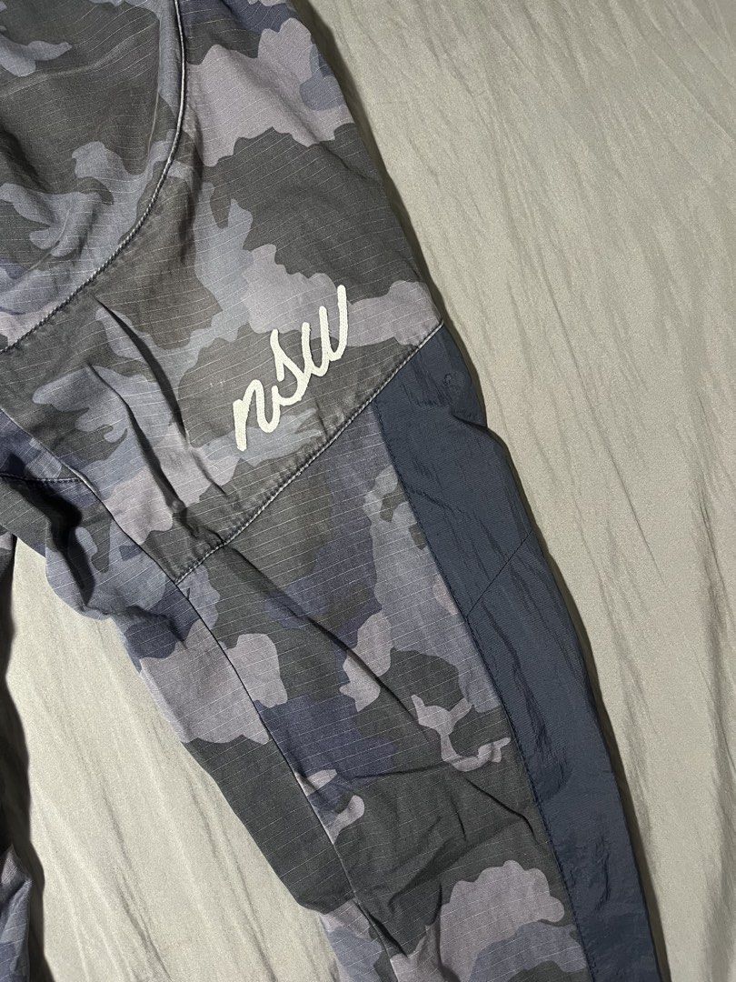 nike NSW camou pants (Category: Joggers) located in Manila. Submitted by lloydiemmfmannn (Listing ID 1467723011, Image 3). Description: nike NSW camou pants sz M on tag w32 l38.5 hem 6 flaws: minor scratches pasay location.