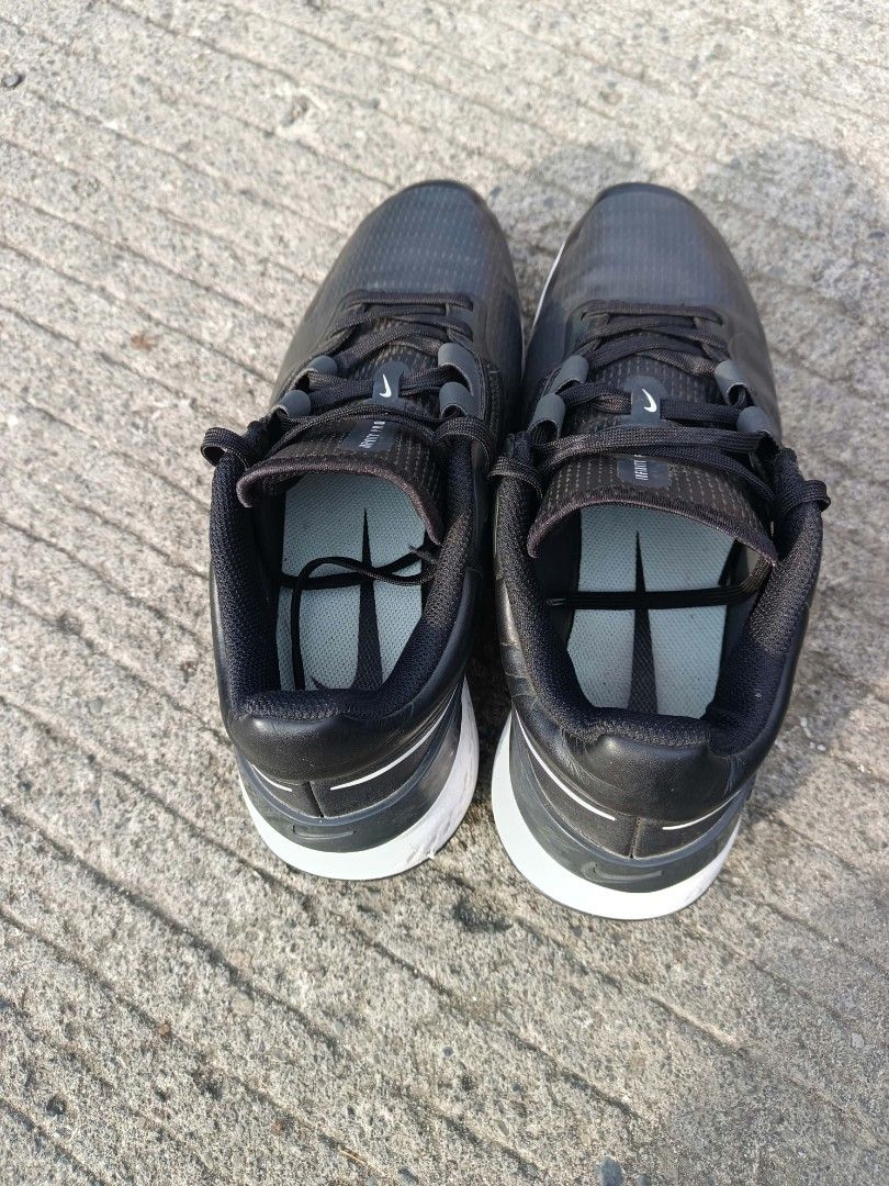Nike React Infinity Pro 2 Black Golf Shoes (Category: Sneakers) located in Davao. Submitted by judelabust72026 (Listing ID 1467749255, Image 3). Description: - Brand/Model: Nike React Infinity Pro 2 Golf Shoes - Color: Classic Black and White - Comfort: Breathable mesh upper with synthetic overlays and cushioned foam midsole - Traction: Textured rubber spikeless outsole for a solid grip during swings - Fit: Secure lace-up closure - Condition: Lig