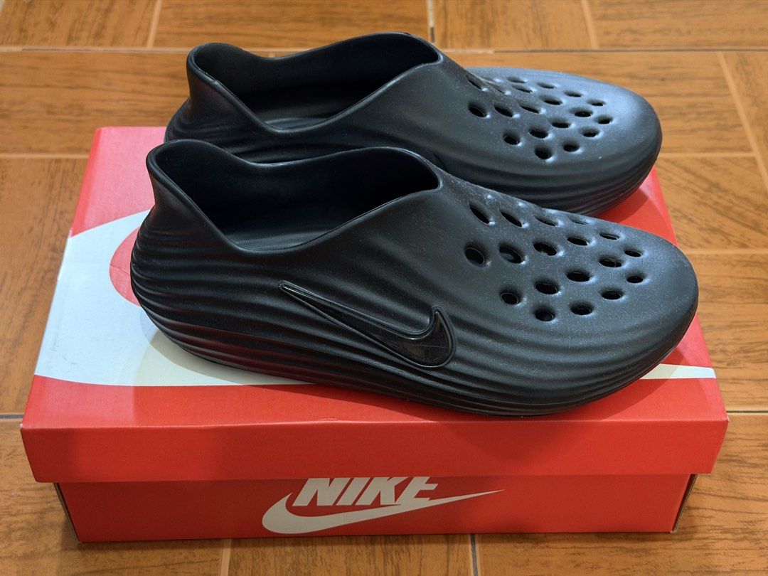 Nike ReactX Rejuven8 Black Clogs M10 W11 (Category: Slippers & Slides) located in Caloocan City. Submitted by sisi_p (Listing ID 1467639990, Image 3). Description: -Nike ReactX Rejuven8 Slip-On Clogs - Color: Black - Size: Men's US 10 / Women's US 11 - Condition: Excellent, used twice - Inclusions: Original red Nike box included .