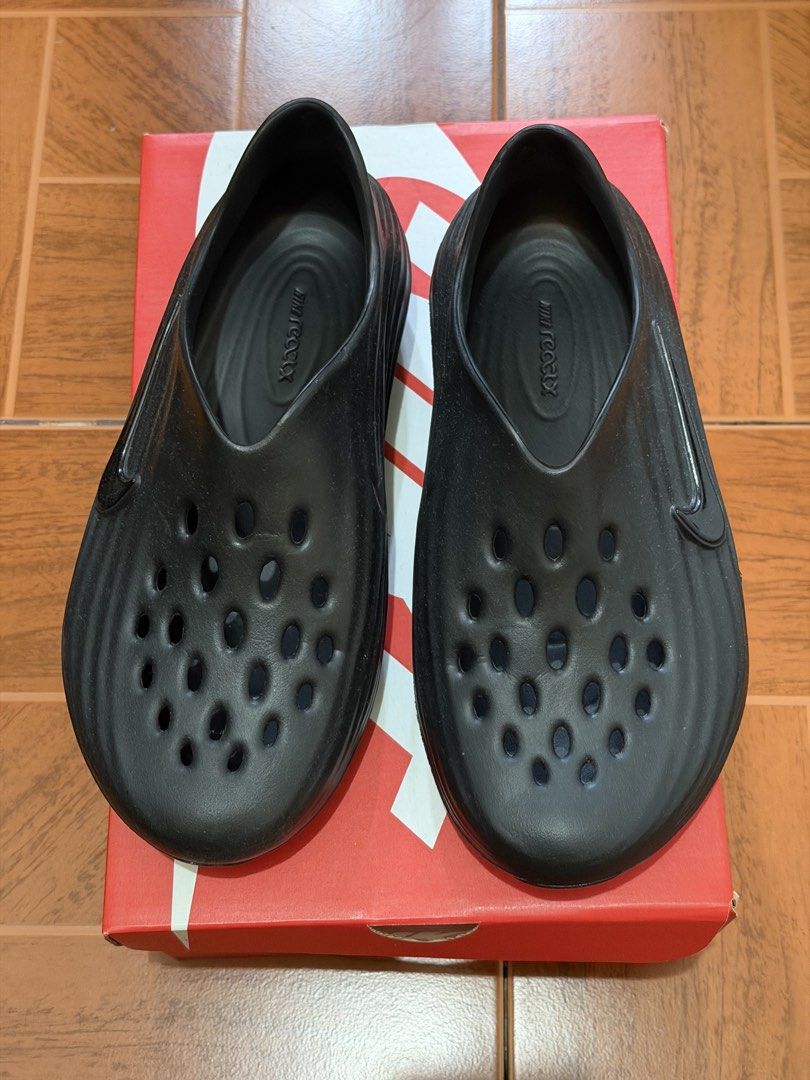Nike ReactX Rejuven8 Black Clogs M10 W11 (Category: Slippers & Slides) located in Caloocan City. Submitted by sisi_p (Listing ID 1467639990, Image 1). Description: -Nike ReactX Rejuven8 Slip-On Clogs - Color: Black - Size: Men's US 10 / Women's US 11 - Condition: Excellent, used twice - Inclusions: Original red Nike box included .