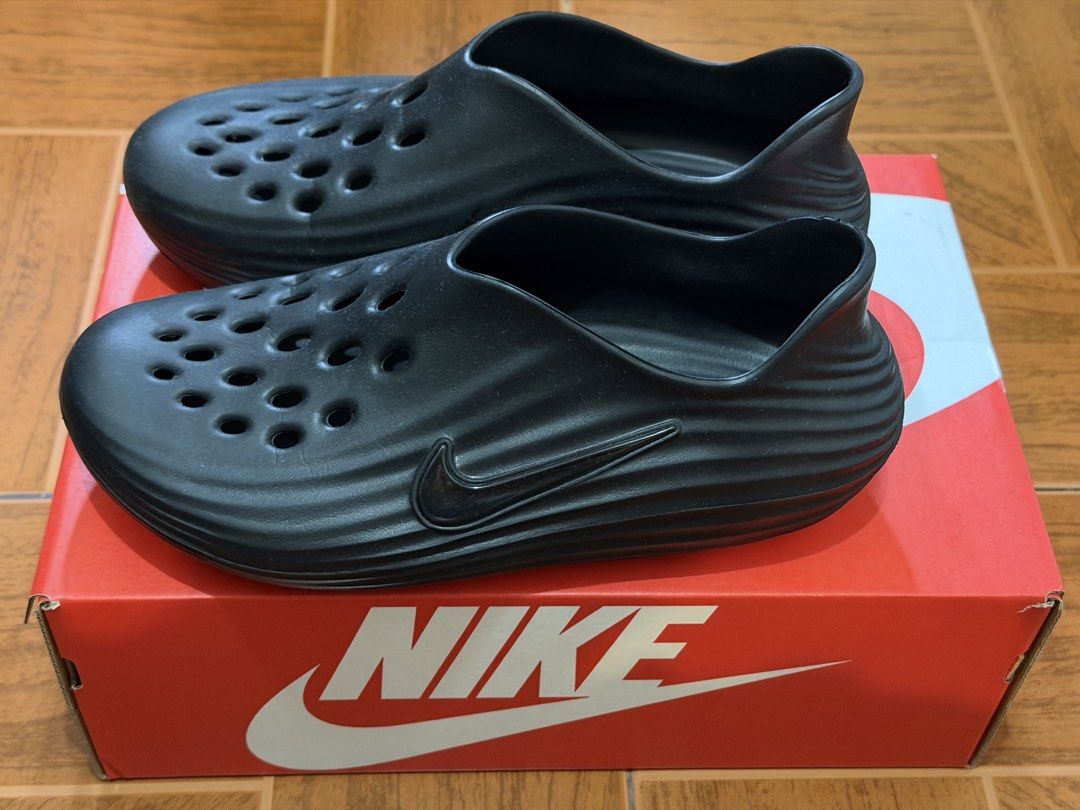 Nike ReactX Rejuven8 Black Clogs M10 W11 (Category: Slippers & Slides) located in Caloocan City. Submitted by sisi_p (Listing ID 1467639990, Image 2). Description: -Nike ReactX Rejuven8 Slip-On Clogs - Color: Black - Size: Men's US 10 / Women's US 11 - Condition: Excellent, used twice - Inclusions: Original red Nike box included .