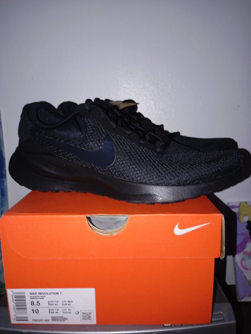 Nike Revolution 7 Black Shoes Size 8.5 (Category: Sneakers) located in Meycauayan. Submitted by livastrid (Listing ID 1467651049, Image 1). Description: - Brand new Nike Revolution 7 (Black / Off Noir) - Size: Men's US 8.5 / UK 7.5 / EUR 42 / CM 26.5 (Women's US 10 / CM 27) - Colorway: Solid black upper with dark swoosh and matching black sole - Condition: Brand new, straight out of the box - Packaging: Complete with original orange Nike shoebox.