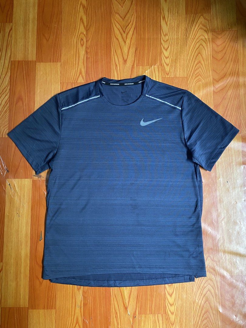 Nike running shirt (Category: Activewear) located in Cebu City. Submitted by jerianix (Listing ID 1467802344, Image 1). Description: Nike running shirt Size large W20.5 L26-27.5 Good condition No issues .
