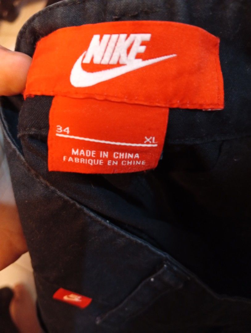 Nike Short (Category: Shorts) located in Bulacan. Submitted by ukaybrandedshop (Listing ID 1467658730, Image 3). Description: Vintage Nike Chino Shorts - Black / Size 34 XL ✅ Size: 34 / XL on tag (Waist 86cm / Hip 100cm) ✅ Color: Black - no fading ✅ Condition: 9/10 - Good condition, no issue ✅ Material: Body 100% Cotton ✅ Details: Red tag, 2 front & 2 back pockets ✅ Legit - Made in China Measurements via tape: Waist: 34 / 86cm Length: ~19-20" Per