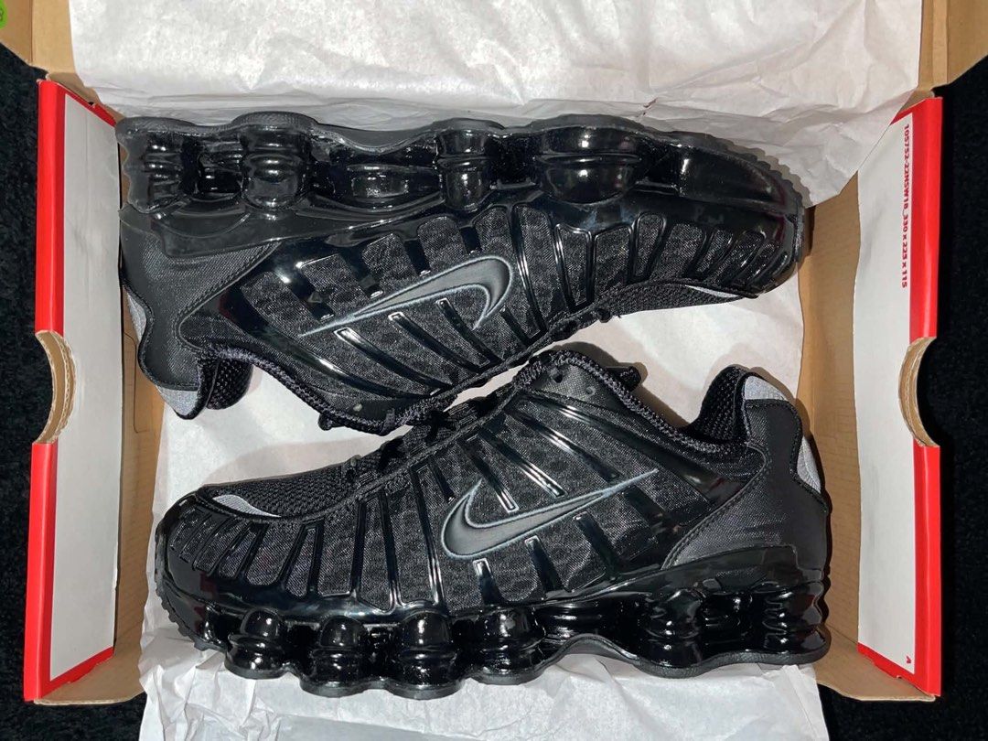 Nike Shox TL Black Metallic Hematite (Category: Sneakers) located in Tanza. Submitted by ice.caballero (Listing ID 1467762068, Image 2). Description: - Model: Nike Shox TL - item serial # AV3595-002 - Colorway: Triple Black with metallic silver details and bold red branding - Condition: Deadstock, tried on in house only - Features: Iconic full-length Shox columns for maximum cushioning, breathable mesh upper with glossy cage overlays - Inclusions