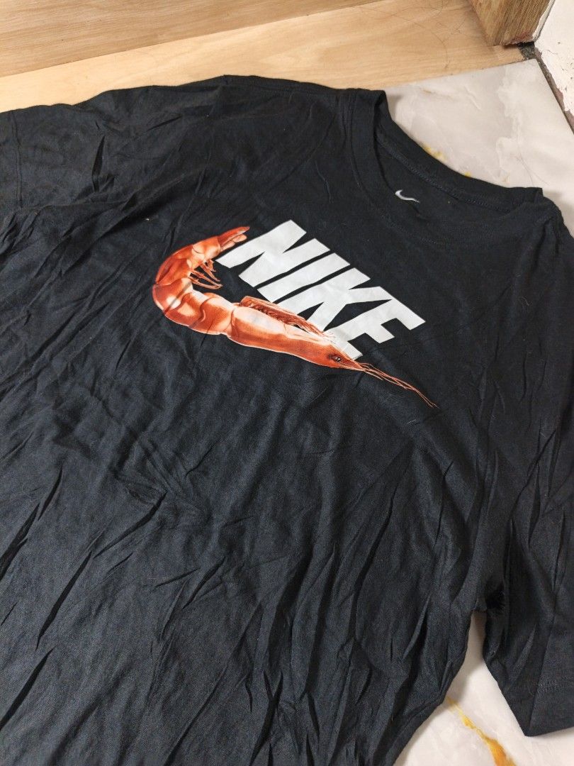 Nike Shrimp Swoosh (Category: Tshirts & Polo Shirts ) located in Nasipit. Submitted by zaynzdrip (Listing ID 1467754262, Image 1). Description: -brandnew condition po -tags intact -no sign of issue and usage -21 width by 27 length -comfortable sootin -large on tag.