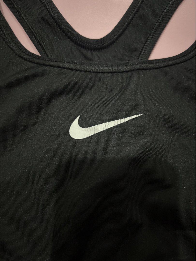 Nike Sports Bra (Category: Activewear) located in Manila. Submitted by chen_clybelles (Listing ID 1467838979, Image 2). Description: with cracks on logo.