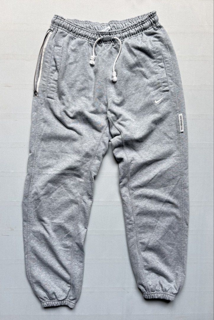 NIKE Standard Issue Jogger - Gray (Category: Joggers) located in Baguio. Submitted by viibodegaaa (Listing ID 1467735287, Image 2). Description: Item: NIKE Standard Issue Jogger - Gray Size: M Waist: 14’ **unstretched** Length: 37’ Price: 1280.