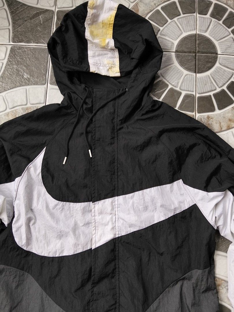 Nike Swoosh (big) Windbreaker (Category: Coats, Jackets and Outerwear) located in Nabua. Submitted by tendollardeals (Listing ID 1467619862, Image 3). Description: Nike Swoosh windbreaker Medium on tag 23.5x27 issue: may stain sa likod check last photo.