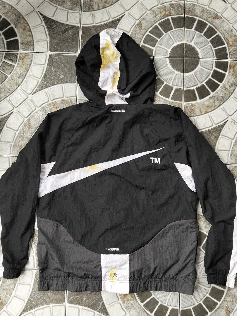 Nike Swoosh (big) Windbreaker (Category: Coats, Jackets and Outerwear) located in Nabua. Submitted by tendollardeals (Listing ID 1467619862, Image 2). Description: Nike Swoosh windbreaker Medium on tag 23.5x27 issue: may stain sa likod check last photo.