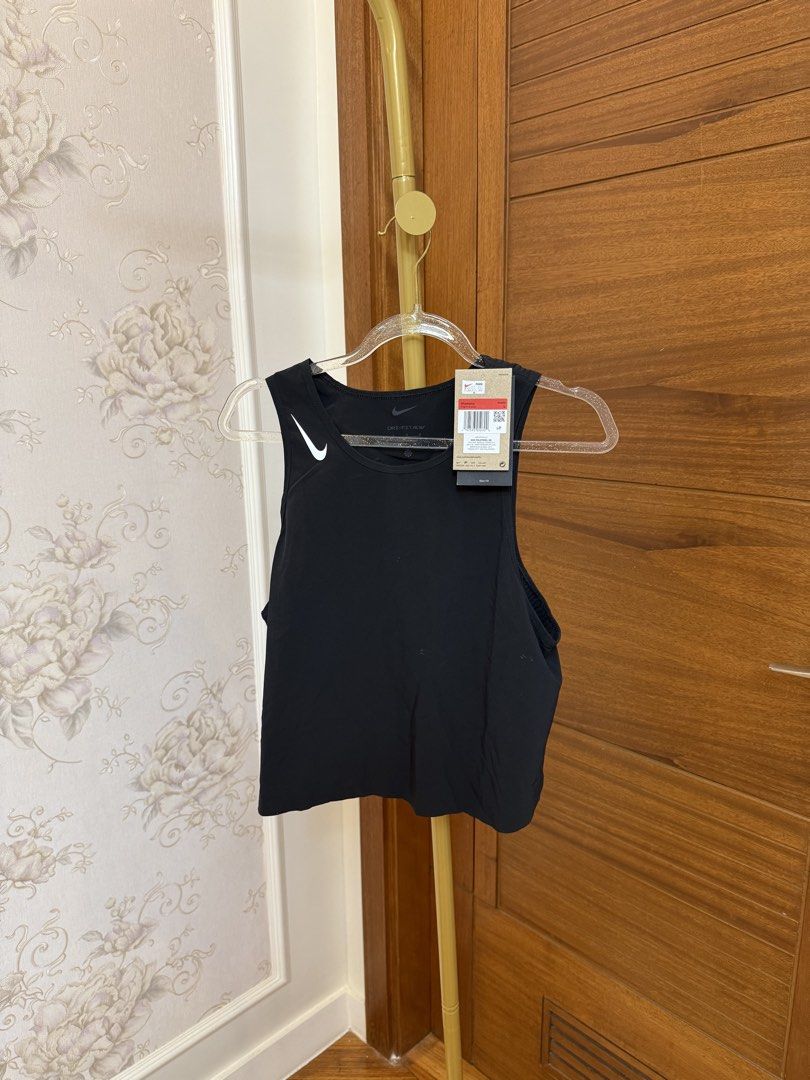 Nike: Top in Black (Category: Activewear) located in Quezon City. Submitted by vpauline (Listing ID 1467627403, Image 1). Description: with tag.
