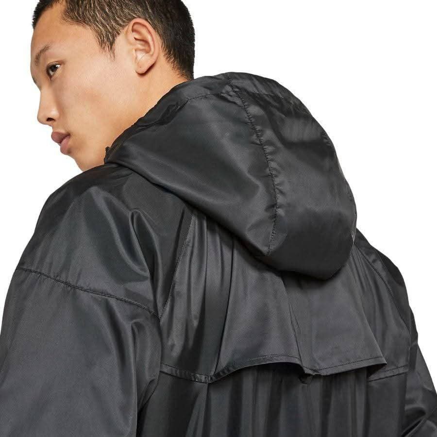 Nike Windrunner Black Hooded Jacket (Category: Coats, Jackets and Outerwear) located in Meycauayan. Submitted by livastrid (Listing ID 1467650755, Image 3). Description: - Brand: Nike - Color: Classic Black with White Logo - Style: Windbreaker jacket with full zip closure and matching hood - Design: Iconic chevron pattern across chest and back - Storage: Secure zippered pockets for essentials - Comfort: Ribbed cuffs and hem to lock in warmth - Ma