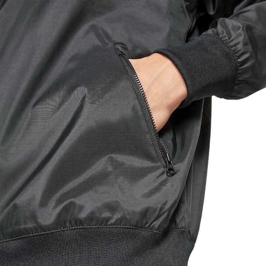 Nike Windrunner Black Hooded Jacket (Category: Coats, Jackets and Outerwear) located in Meycauayan. Submitted by livastrid (Listing ID 1467650755, Image 2). Description: - Brand: Nike - Color: Classic Black with White Logo - Style: Windbreaker jacket with full zip closure and matching hood - Design: Iconic chevron pattern across chest and back - Storage: Secure zippered pockets for essentials - Comfort: Ribbed cuffs and hem to lock in warmth - Ma