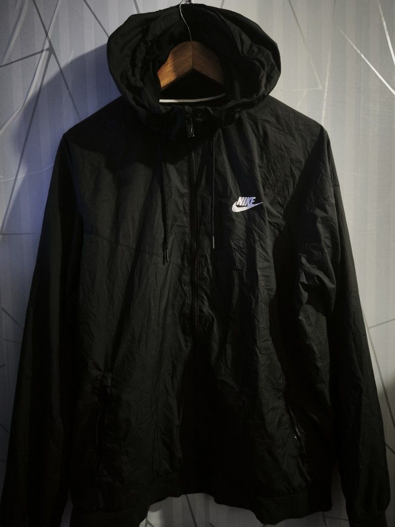 Nike Windrunner Windproof Sports Jacket Black XL (Category: Coats, Jackets and Outerwear) located in Manila. Submitted by matthewlla74087 (Listing ID 1467716542, Image 1). Description: Nike Windbreaker 📍28x23 📍AsnewCondition 📍9.8/10 Color Rate 📍No issue 📍Pasay Protacio - Brand: Nike - Style: Windrunner Jacket - Color: Classic Black with White Logo - Size: XL - Material: Lightweight and windproof - Features: Full zip front, adjustable hood co