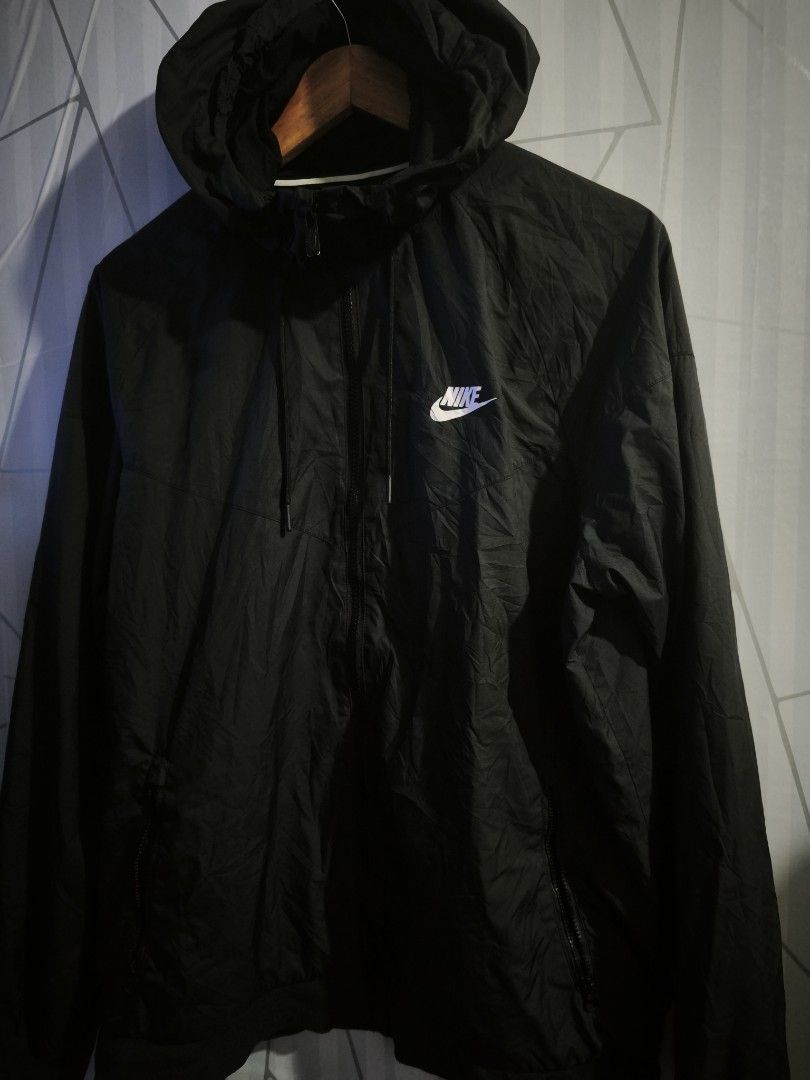 Nike Windrunner Windproof Sports Jacket Black XL (Category: Coats, Jackets and Outerwear) located in Manila. Submitted by matthewlla74087 (Listing ID 1467716542, Image 3). Description: Nike Windbreaker 📍28x23 📍AsnewCondition 📍9.8/10 Color Rate 📍No issue 📍Pasay Protacio - Brand: Nike - Style: Windrunner Jacket - Color: Classic Black with White Logo - Size: XL - Material: Lightweight and windproof - Features: Full zip front, adjustable hood co
