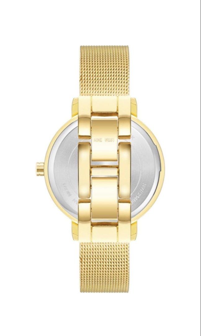 Nine West Women's Mesh Bracelet Watch Gold (34mm) (Category: Women's Watches) located in Quezon City. Submitted by mackoyusgoods (Listing ID 1467682210, Image 3). Description: Lightweight mesh design stays comfortable all day. Elegant rose gold tone complements any outfit. Scratch-resistant mineral crystal keeps face protected Mineral crystal lens; light gold-tone dial with matching hands and markers Gold-tone stainless steel mesh bracelet with a