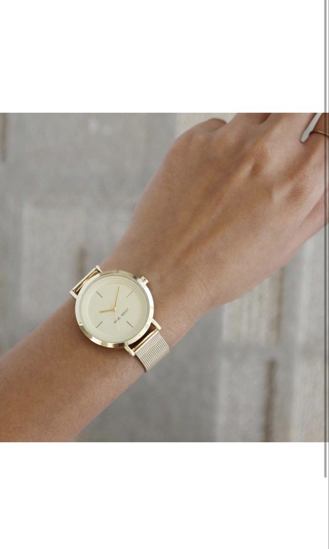 Nine West Women's Mesh Bracelet Watch Gold (34mm) (Category: Women's Watches) located in Quezon City. Submitted by mackoyusgoods (Listing ID 1467682210, Image 2). Description: Lightweight mesh design stays comfortable all day. Elegant rose gold tone complements any outfit. Scratch-resistant mineral crystal keeps face protected Mineral crystal lens; light gold-tone dial with matching hands and markers Gold-tone stainless steel mesh bracelet with a