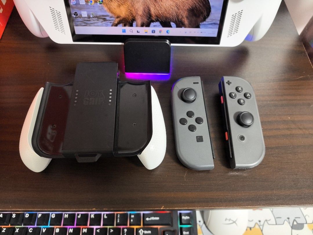 Nintendo Switch (Category: Nintendo) located in Valenzuela. Submitted by eb11042019 (Listing ID 1467617354, Image 1). Description: (FOR SALE SECOND HAND NINTENDO SWITCH JOY-CON WITH GRIP) 1,200 last price posted. Issue nya is yung SL/SR Both hindi na gumagana. May crack din sa upper part makikita po sa picture and sign of usage na din. Na re-shell po sya ng gray pero original case pa din po yan. Nasaakin pa yung prev case nya na neon as proof. 1,
