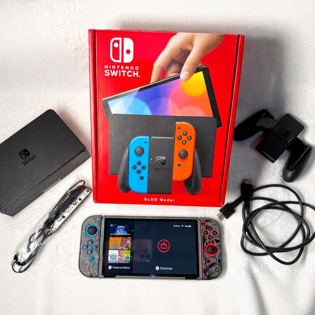 Nintendo Switch (Category: Nintendo) located in San Mateo. Submitted by mysticfish.4c859f (Listing ID 1467716163, Image 1). Description: 💡 Bought from Game Extreme store a year ago — rarely used! Impulse buy so barely touched, still in mint condition! ✨ ✅ What you get: • Nintendo Switch OLED Console • Upgraded 512GB storage • 62 games installed 🎉 • Animal Crossing: New Horizons Game Card 🦊 • Original box + complete accessories • Official Ninte