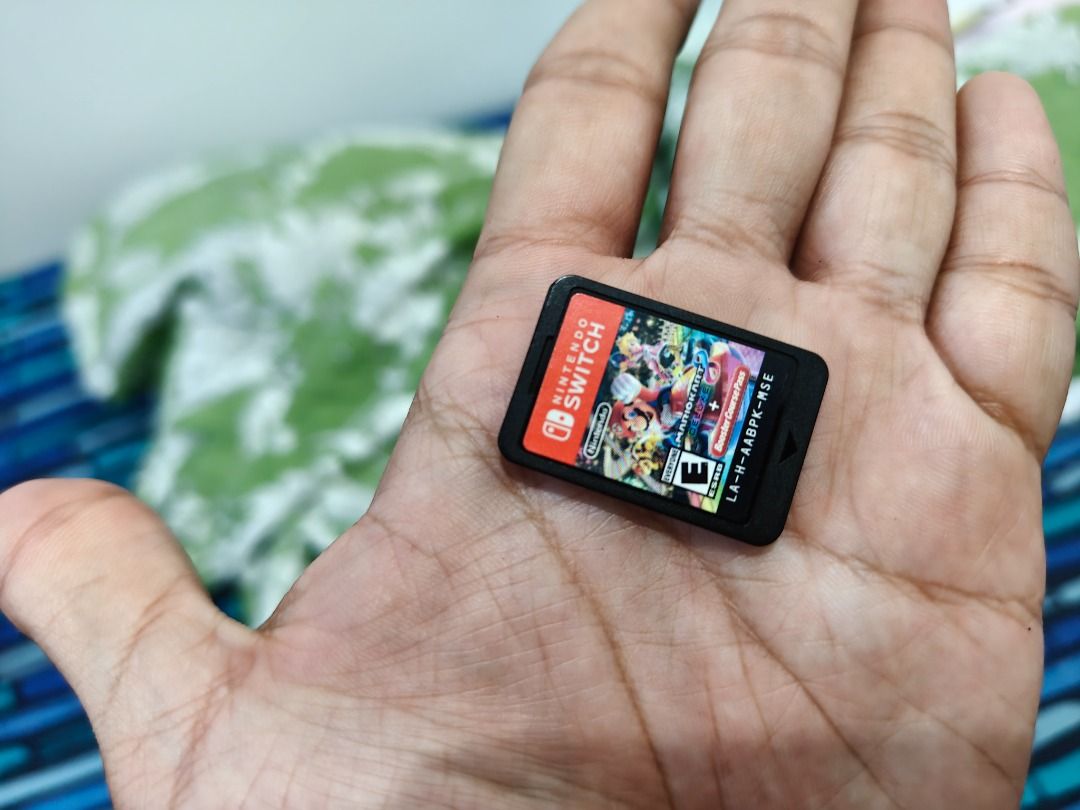 Nintendo Switch Console with Gold Controller and Game (Category: Nintendo) located in Caloocan City. Submitted by oliverval61534 (Listing ID 1467831129, Image 2). Description: RUSH SELLING OR SWAP SA SWITCH 2 complete or Tablet Nintendo Switch OLED with Charger and Dock (NO JOYCONS) With Thanos Gamesir G8 Plus Controller With Mario Kart 8 + Booster Course Pass Manila Area.