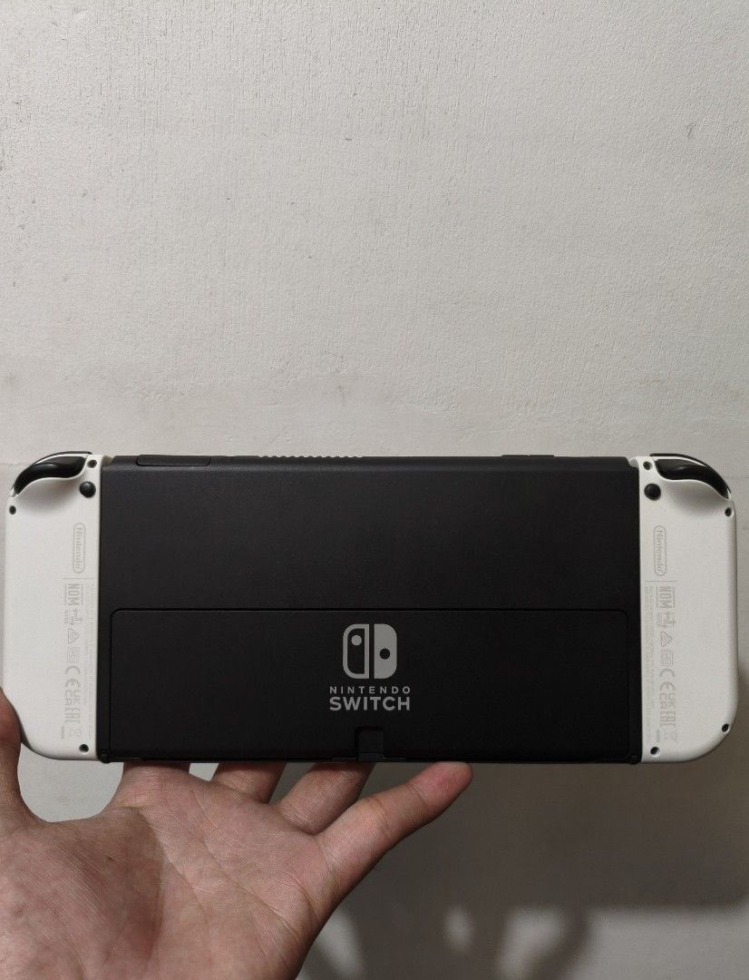 Nintendo Switch OLED + Complete Accessories & Bag + Extra Controller (Category: Nintendo) located in Navotas City. Submitted by alexissedi68303 (Listing ID 1467614470, Image 3). Description: FOR SALE: Nintendo Switch OLED + Complete Accessories & Bag + Extra Controller Condition: 9.5/10 P9,990.00 FIXED Inclusions: ✅OLED tablet ✅Original Joy-cons ✅Original Joy-con straps & Original Grip ✅Original Dock & Original HDMI ✅Original Charger ✅Bag ✅Temper