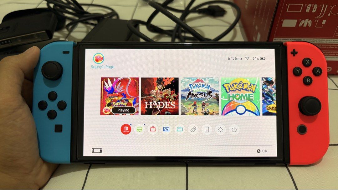 Nintendo Switch OLED (Neon) - Complete Box + Case & Screen Protector (Bought May 2026) (Category: Nintendo) located in Calamba. Submitted by josephsalv38175 (Listing ID 1467723933, Image 2). Description: Selling my barely used Nintendo Switch OLED unit. Purchased last May 2026 from GameXtreme Official Store (TikTok Shop). Pristine console condition, complete with protection and accessories! PRICE: ₱11,500 (Slightly negotiable for quick/sure buyer