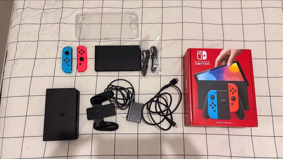 Nintendo Switch OLED (Neon) - Complete Box + Case & Screen Protector (Bought May 2026) (Category: Nintendo) located in Calamba. Submitted by josephsalv38175 (Listing ID 1467723933, Image 1). Description: Selling my barely used Nintendo Switch OLED unit. Purchased last May 2026 from GameXtreme Official Store (TikTok Shop). Pristine console condition, complete with protection and accessories! PRICE: ₱11,500 (Slightly negotiable for quick/sure buyer
