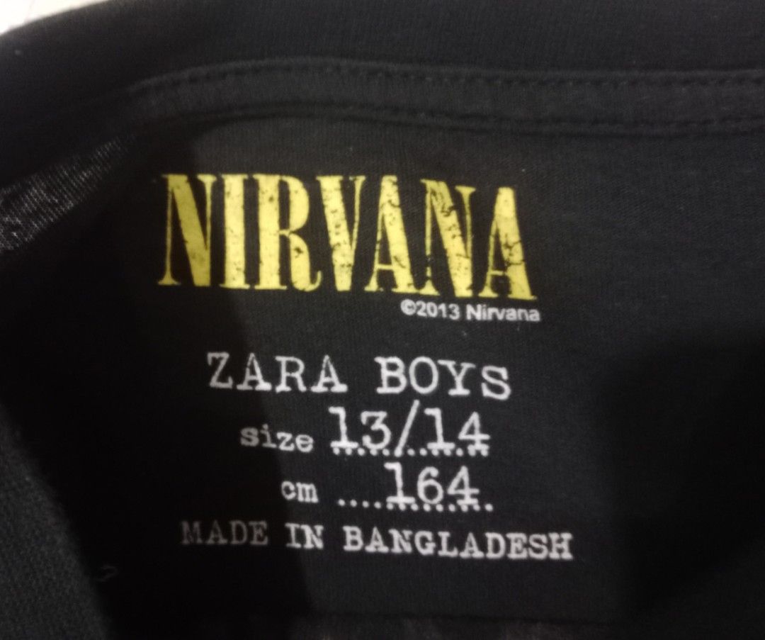 Nirvana and Guns N' Roses long sleeve shirts bundle (Category: Activewear) located in Silang. Submitted by densrodrig08604 (Listing ID 1467810700, Image 2). Description: Two band tees in one bundle. First is a black Nirvana long sleeve from Zara Boys, size 13/14 years or 164 cm, dated 2013, featuring band members and Seattle graphics. Second is a dark grey heather Guns N' Roses long sleeve from Bravado, size M, with the classic bullet logo and ro